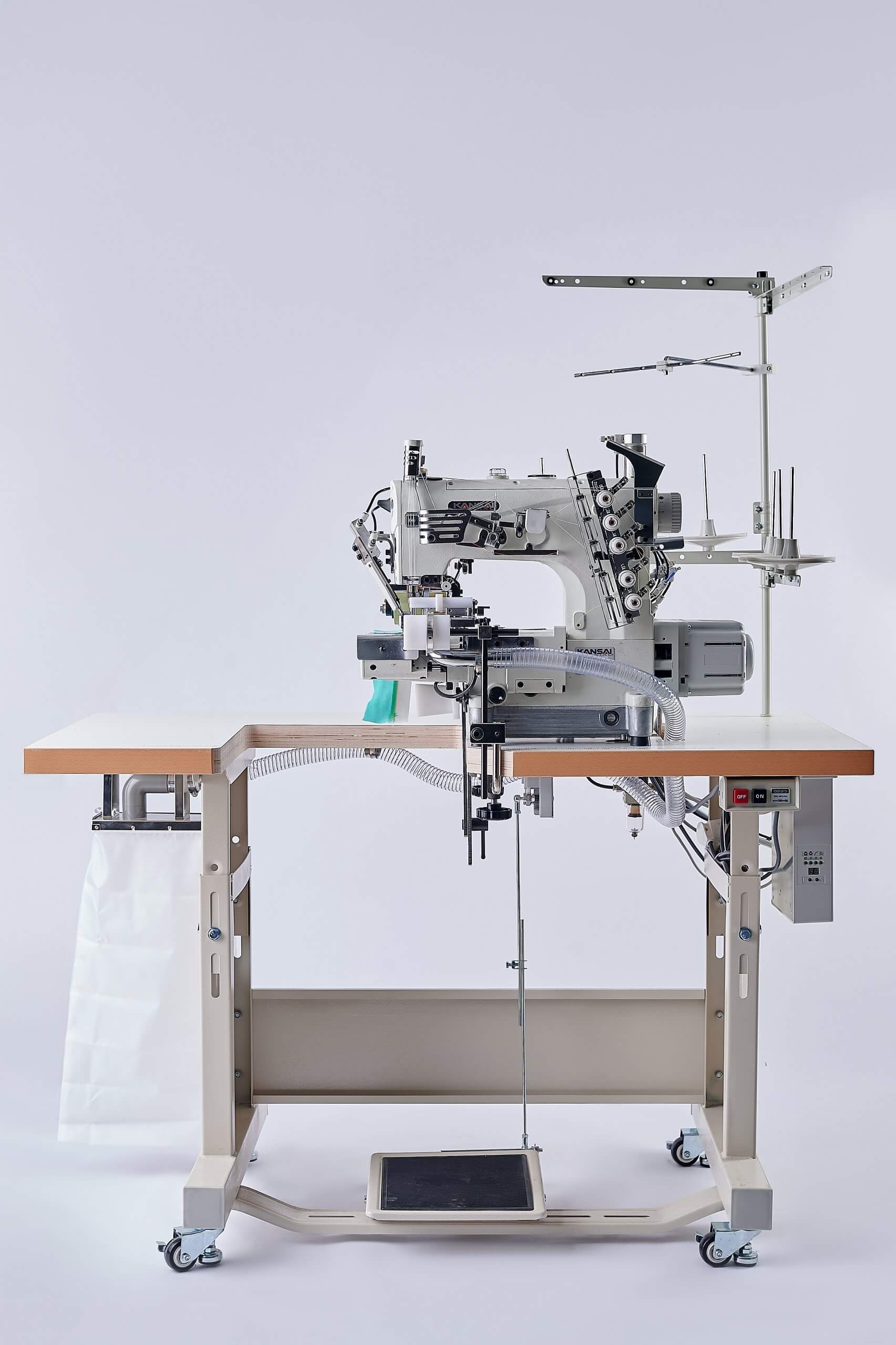 Розпошивальна машина KANSAI SPECIAL NR-9803GPEHK-UTA-1/4 (6.4 мм)  з циліндричною платформою