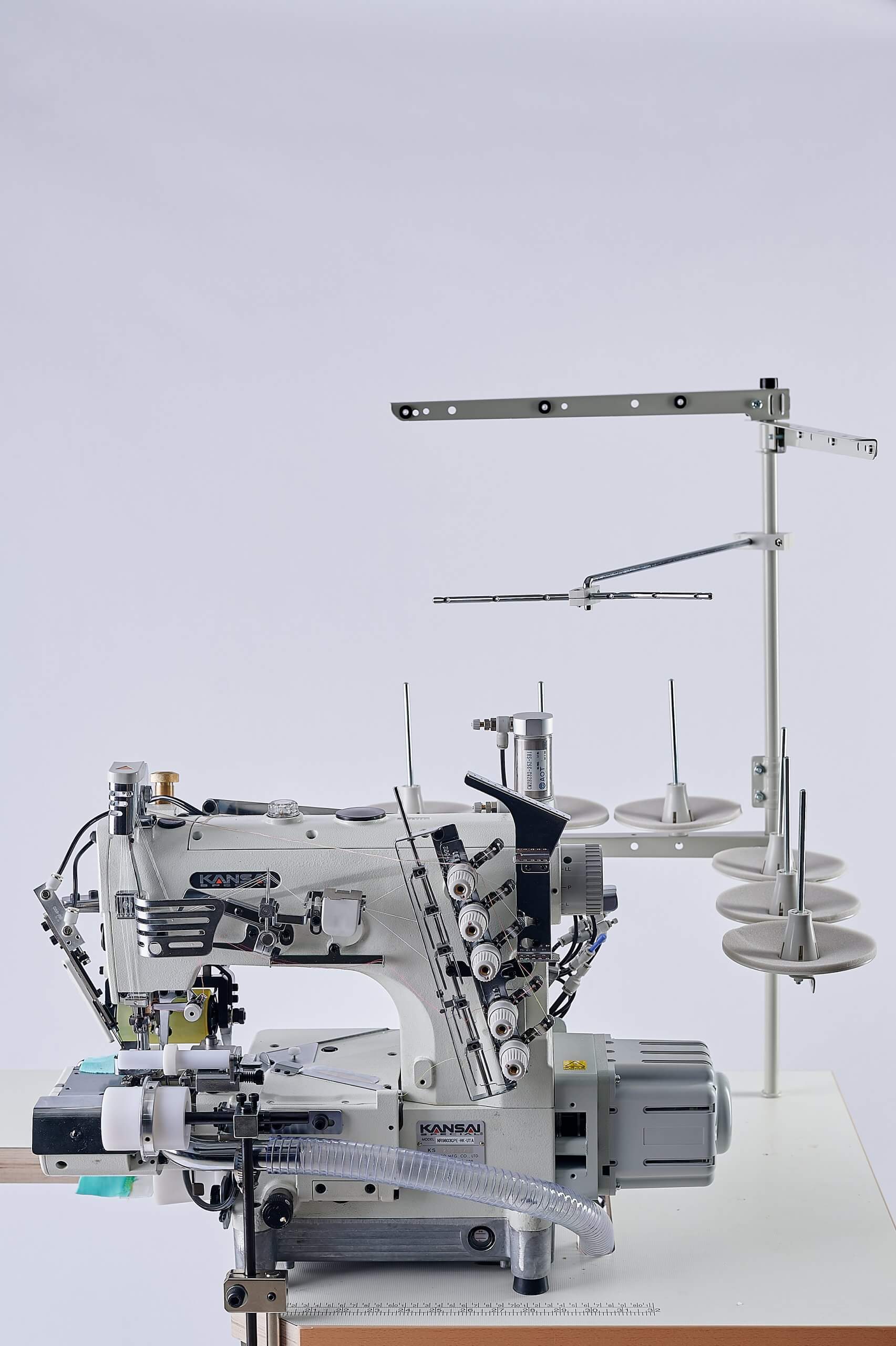 Розпошивальна машина KANSAI SPECIAL NR-9803GPEHK-UTA-1/4 (6.4 мм)  з циліндричною платформою