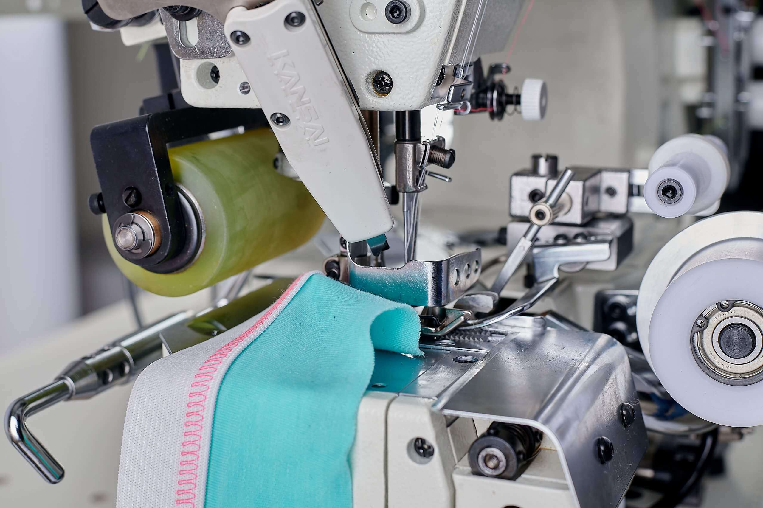 Розпошивальна машина KANSAI SPECIAL NR-9803GPEHK-UTA-1/4 (6.4 мм)  з циліндричною платформою