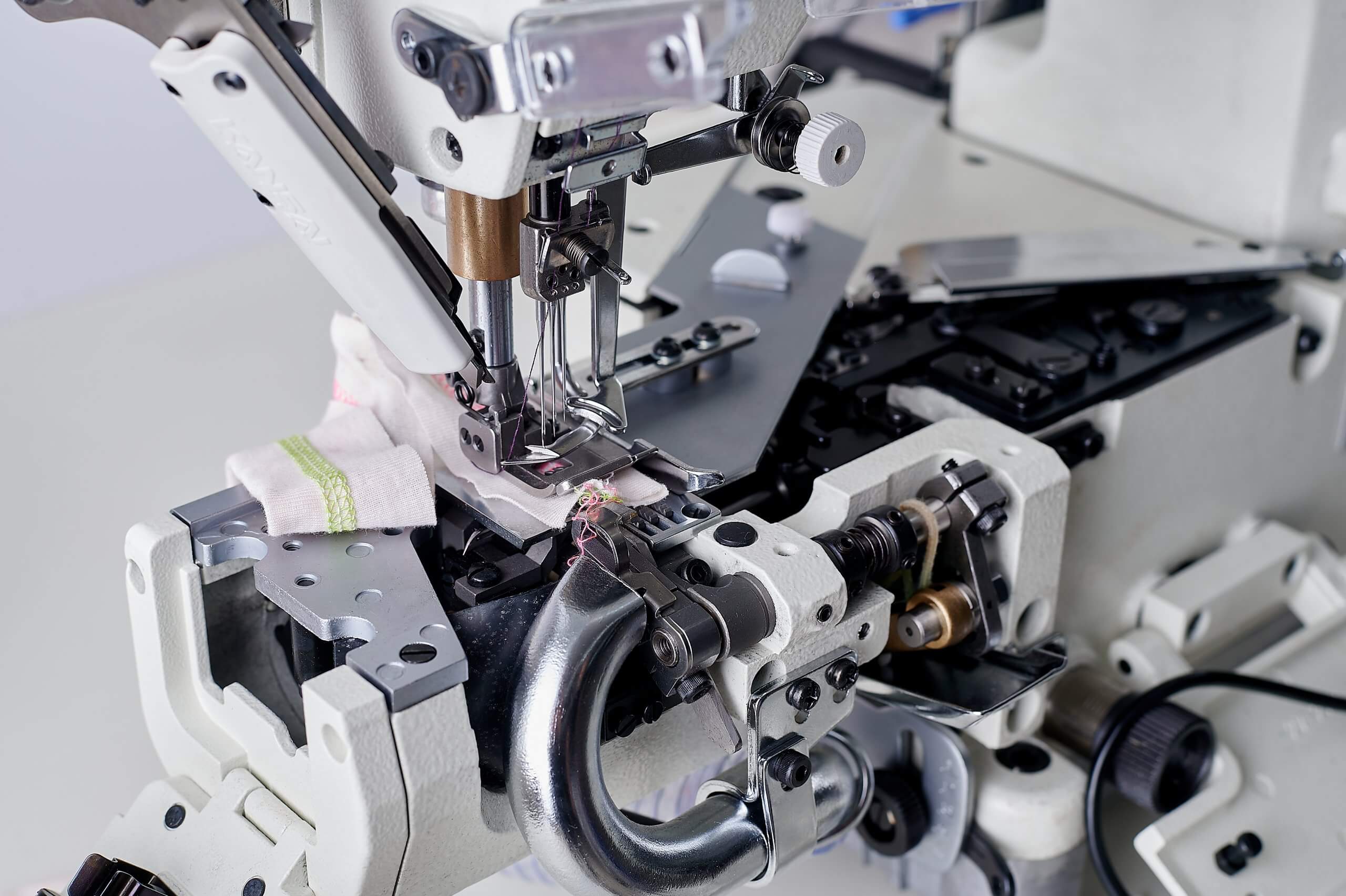 Розпошивальна машина KANSAI SPECIAL NR9803GALK-UTA-7/32 (5.6 мм) з циліндричною платформою