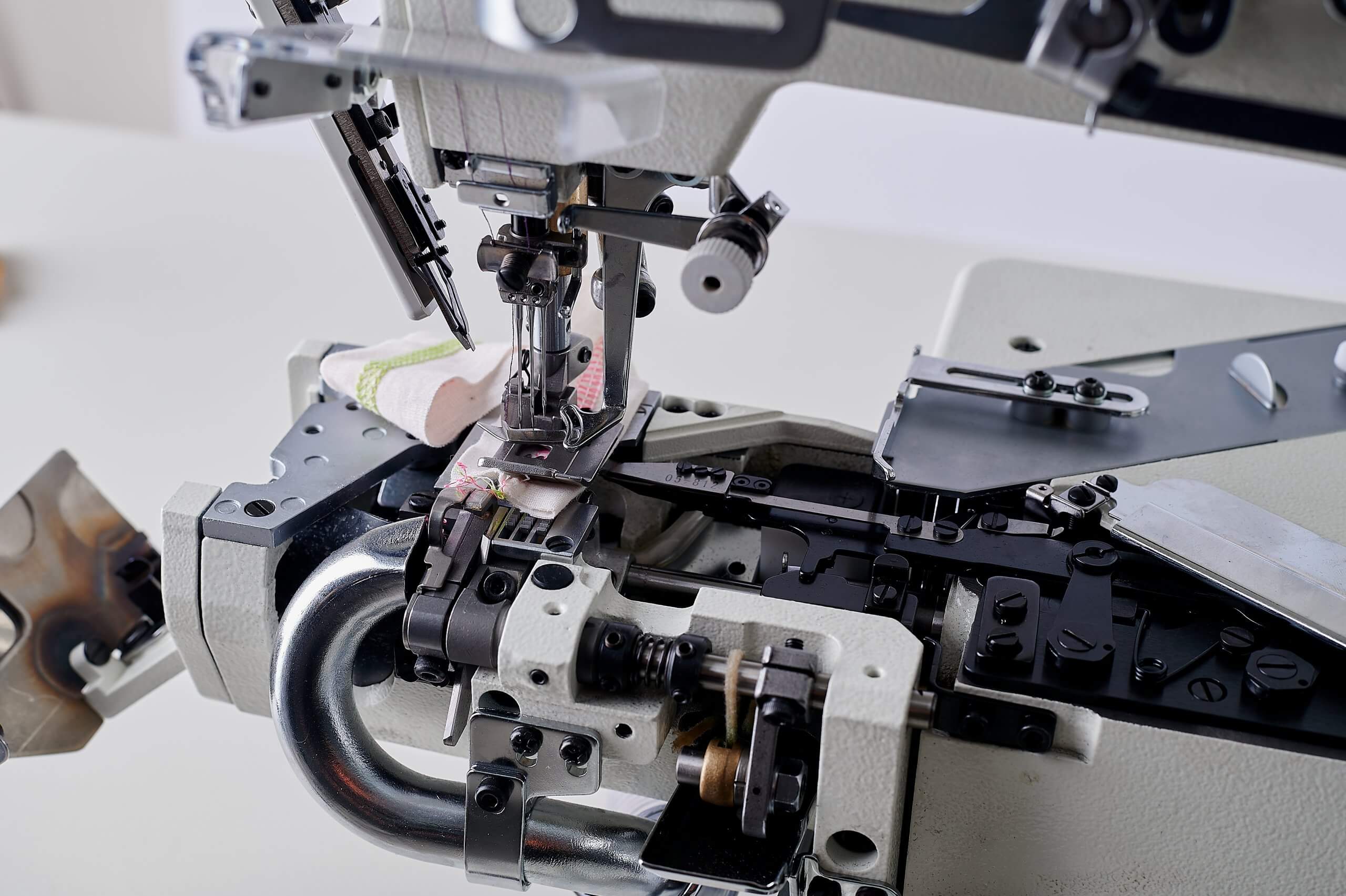 Розпошивальна машина KANSAI SPECIAL NR9803GALK-UTA-7/32 (5.6 мм) з циліндричною платформою