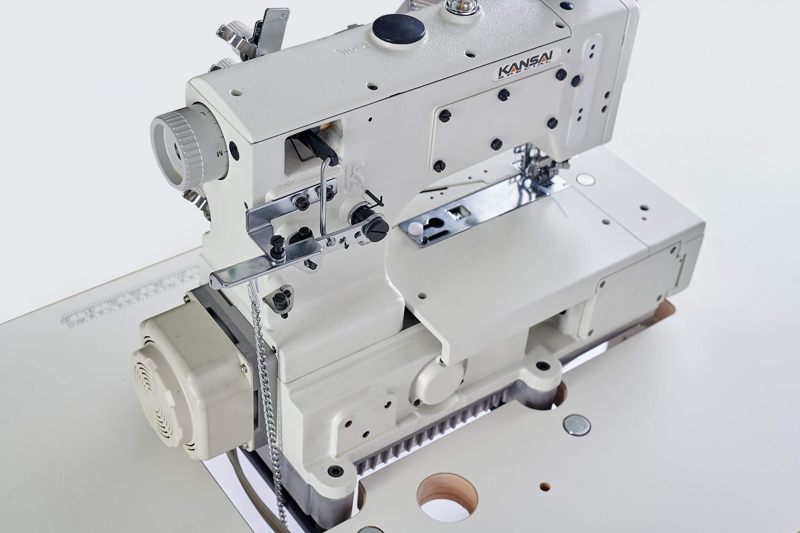 Розпошивальна машина KANSAI SPECIAL NW-8803GMG- 7/32 (5.6 мм) з верхнім та нижнім застилом