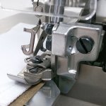 Оверлок Juki MO6714DABE644H/G39/Q141 з пристосуванням для настрочування тасьми та утопленою стільницею