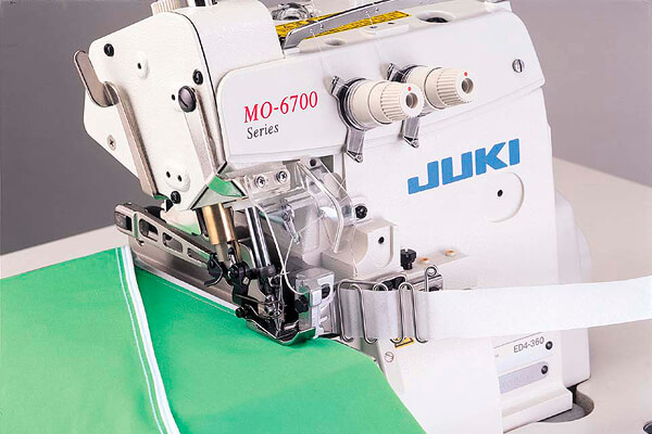 Оверлок Juki MO6714DABE644H/G39/Q141 з пристосуванням для настрочування тасьми та утопленою стільницею